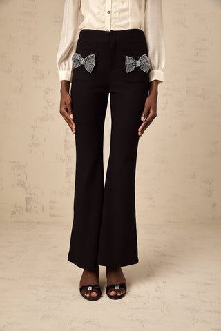 Gelsomina Studded Bow-Detail Flared Trousers — Black