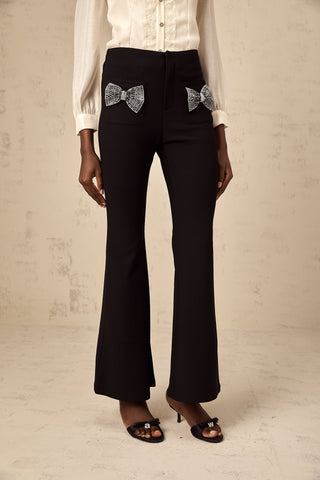 Gelsomina Studded Bow-Detail Flared Trousers — Black