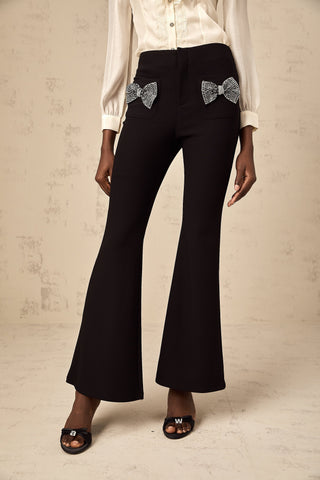 Gelsomina Studded Bow-Detail Flared Trousers — Black