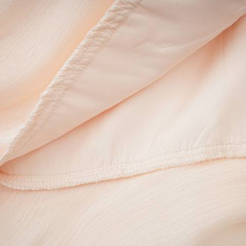 Eugénie Pleated Ruffle Mini Dress — Neutral